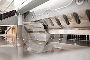 Cutting paper with professional press machine