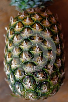 Cutting of pineapple using knife