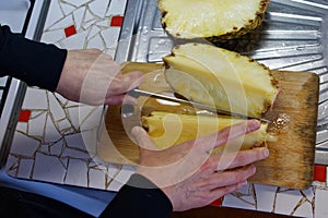 Cutting of pineapple using knife