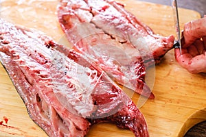 Cutting raw fish tuna food,  background cut