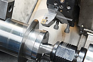 cutting shaft at metal working on lather machine