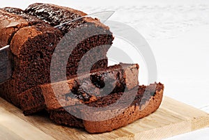 Cutting slice belgium chocolate cake focus knife