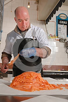 Cutting smoked salmon