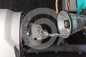 Cutting tool making machine control by CNC program.