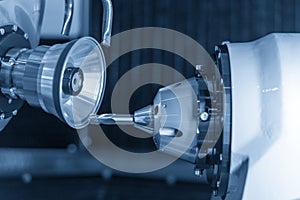 Cutting tool making machine control by CNC program.