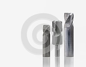 cutting tool spotfacing endmill reamer and chamfer drill. material is Tungsten and steel. for metalwork part automotive. on white