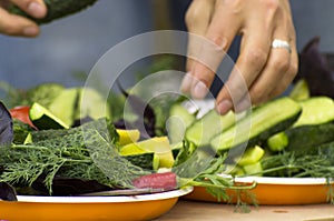 Cutting vegetables and arranging them into plates