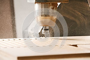 Cutting wood using a machine with numerical control. Cnc tool.