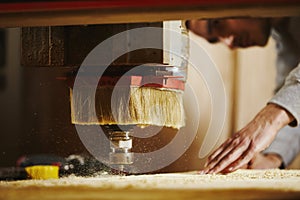 Cutting wood using a machine with numerical control. Cnc tool.