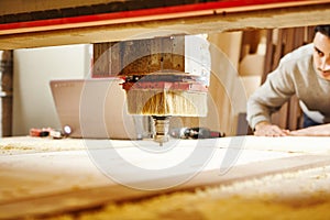 Cutting wood using a machine with numerical control. Cnc tool.