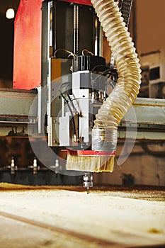 Cutting wood using a machine with numerical control. Cnc tool.