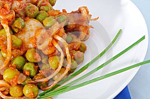 Cuttlefish with peas and chive, closeup