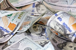 cuved U.S. 100 dollar banknotes background