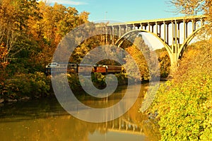 Cuyahoga Valley Scenic Railroad train under bridge overpass