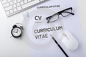 Job interview with cv, clock, computer