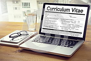 CV - Curriculum Vitae (Job interview concept with business CV re photo