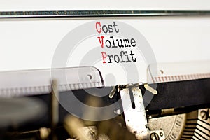 CVP cost volume profit symbol. Concept words CVP cost volume profit typed on retro old typewriter on a beautiful white paper