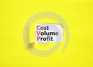 CVP cost volume profit symbol. Concept words CVP cost volume profit on white paper on a beautiful yellow background. Business and