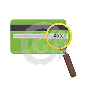 CVV bank card under the magnifying glass