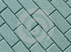 Cyan color cobblestone pavement close-up