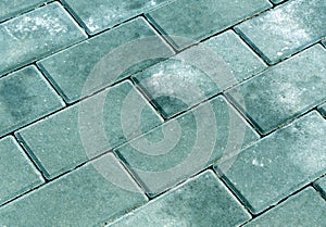 Cyan color cobblestone pavement texture.