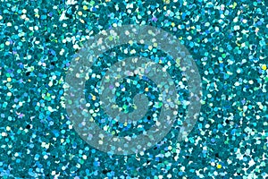 Cyan glitter for texture or background.