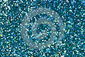 Cyan glitter for texture or background.