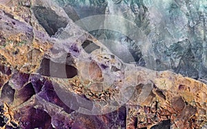 Cyan and lilac fluorite texture close-up