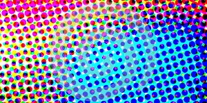 Cyan Magenta yellow black color halftone abstract background from balls on white