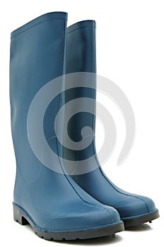 Cyan rubber boots isolated