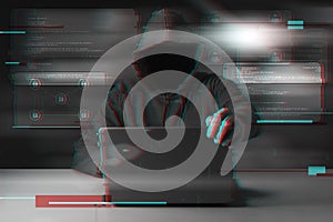 Cyber attack with unrecognizable hooded hacker
