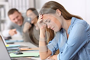 Cyber bullying victim being photographed at office photo