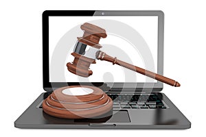 Cyber Law Concept. Moder Laptop with wooden gavel