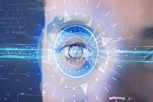 Cyber man with technolgy eye looking into blue iris