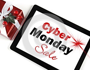Cyber Monday Sale shopping message on black computer tablet device with gift photo
