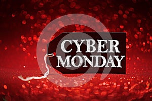 Cyber Monday sale tag on red glitter background