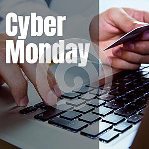 Cyber monday text over hands of caucasian man using laptop and credit card shopping online