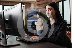 Cyber officer working with binary numbers for database application development through neural nodes.