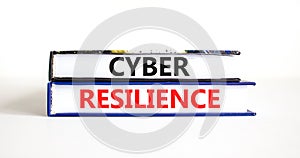 Cyber resilience symbol. Concept word Cyber resilience typed on books. Beautiful white table white background. Business and cyber