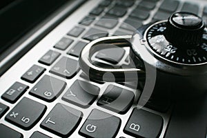 Cyber Security With Black Combination Lock On Laptop Keyboard Close Up High Quality