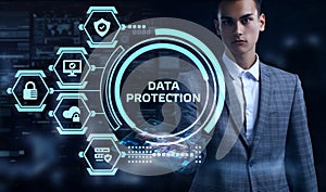 Cyber security data protection business technology privacy concept. Young businessman select the word Data protection on the