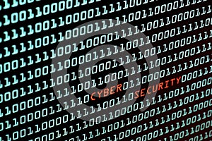 Cyber Security text and binary code concept from the desktop screen, selective focus