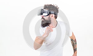 Cyber sport. Guy with head mounted display interact virtual reality. Hipster play virtual sport game. Virtual race. Man