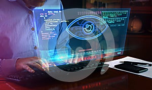 Cyber spying hacking and supervise eye symbol on screen illustration photo