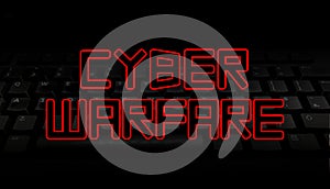Cyber Warfare text over black keyboard illustration