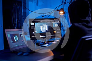 programmer working with 3d graphics on computer