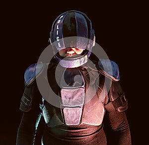 Cyberpunk future concept. Portrait of bionic cyborg police officer in dark. Halfman robot looks at camera. Futuristic science photo