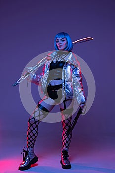 Cyberpunk woman with sword in silver jacket