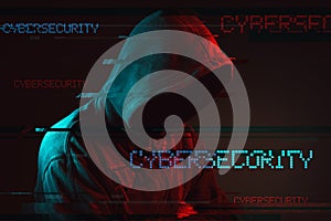 Cybersecurity concept with faceless hooded male person