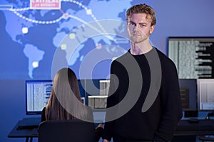 Cybersecurity team working on threat detection in a high-tech SOC environment